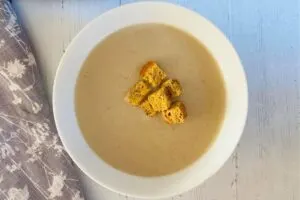 chicken soup in bowl with croutons