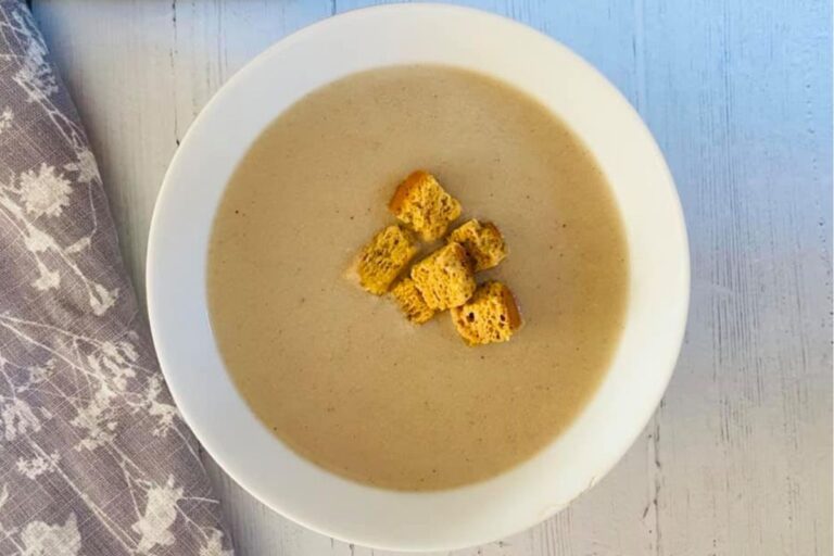 chicken soup in bowl with croutons
