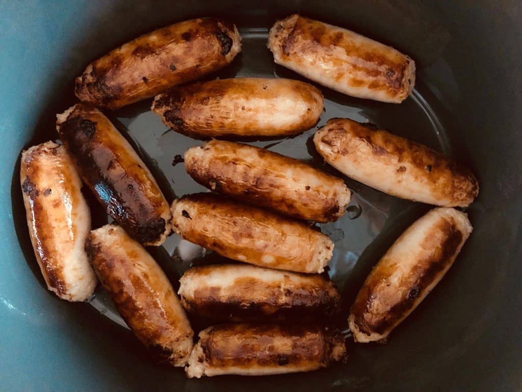 browned sausages in slow cooker