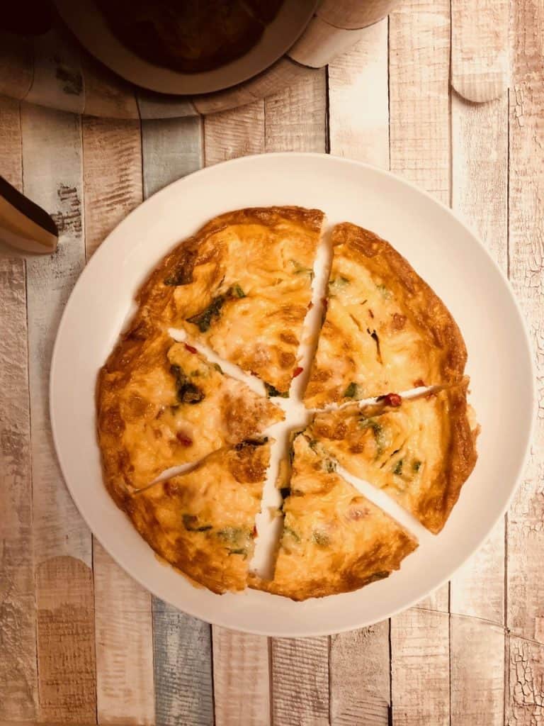 frittata on a plate by an air fryer