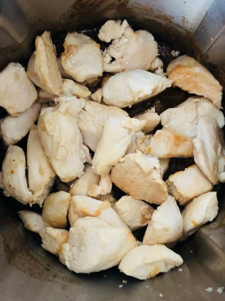 cooked chicken in a soup maker