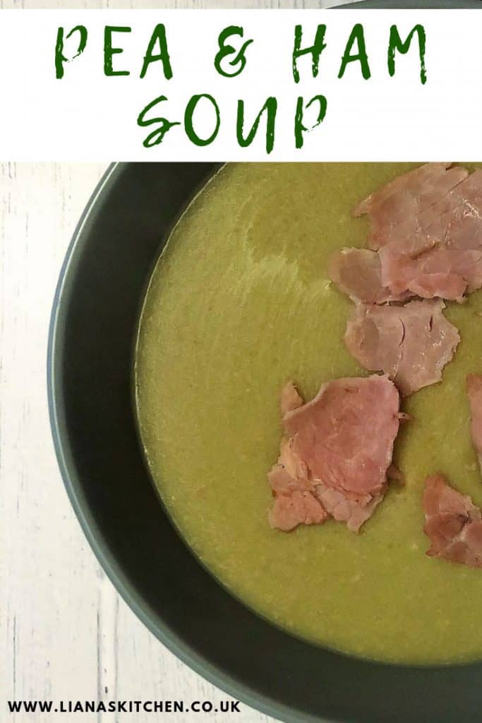 Pea and ham soup in a bowl with shredded ham on top