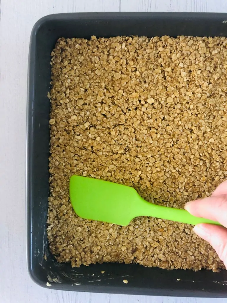 flapjack mixture in baking tin