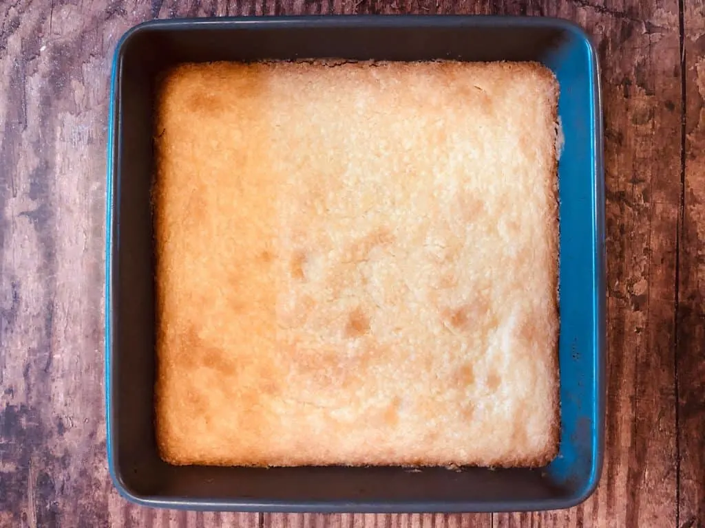 shortbread in baking tin straight out of the oven