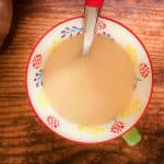 chicken soup in a bowl with spoon