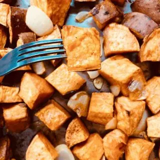 sweet potato on a fork after baking