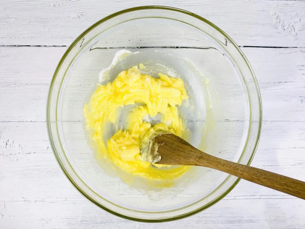 cream butter and sugar together in a bowl