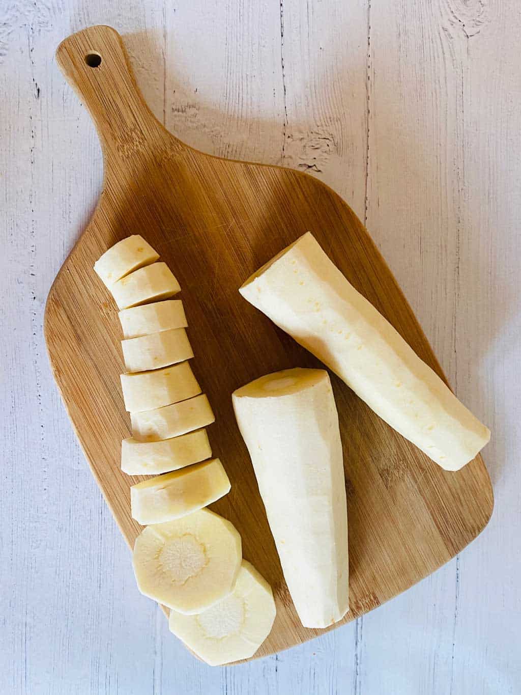 chopped parsnips on a chopping board