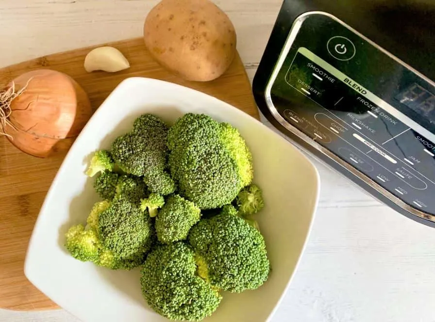 ingredients next to the Ninja soup maker for broccoli and cheddar soup