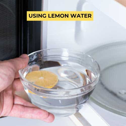 putting bowl of lemon water in the microwave
