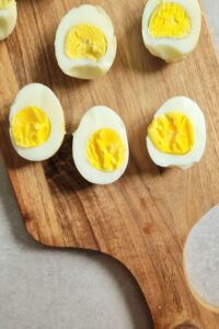 air fryer eggs on a wooden chopping board