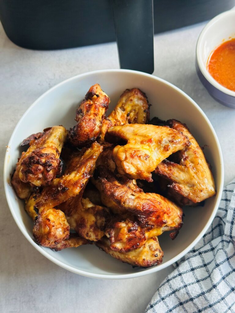 Air Fryer Chicken Wings with hot sauce