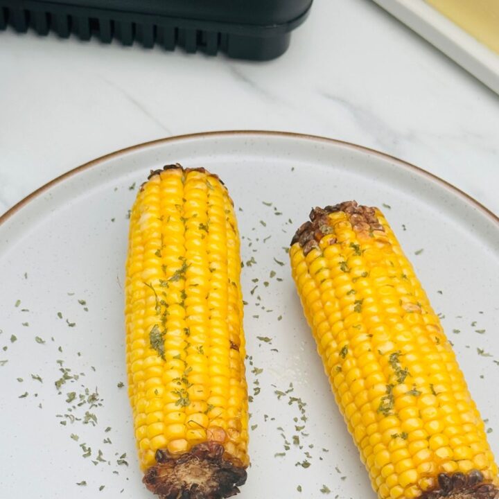 corn on the cob next to air fryer