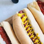 hot dogs next to air fryer