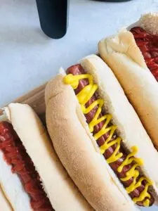 hot dogs next to air fryer