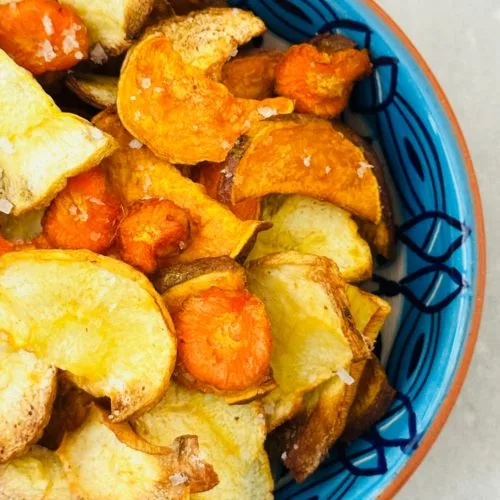 Air Fryer Vegetable Crisps served in a blue bowl