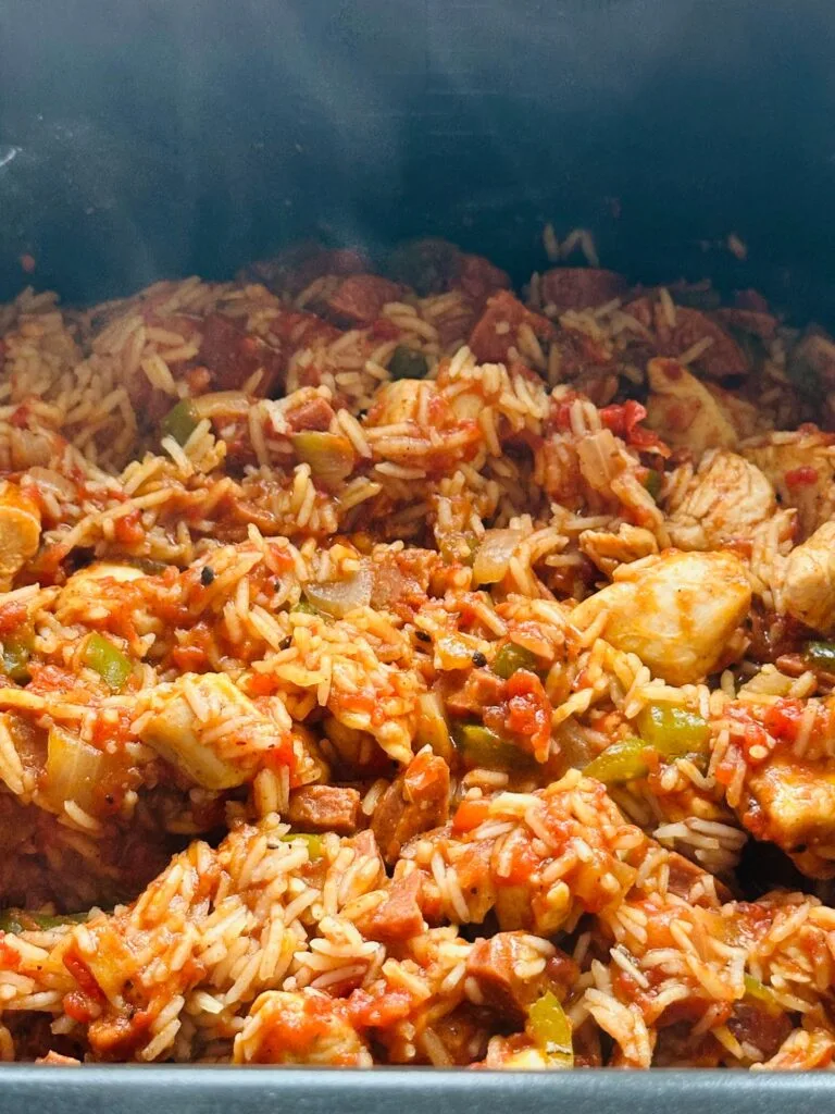 cooked Cajun chicken, chorizo and rice with chopped tomatoes and green peppers, up close