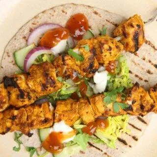 Chicken tikka kebabs in tortilla wrap
