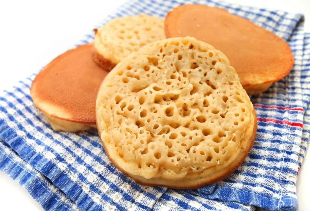 Crumpets on blue cloth