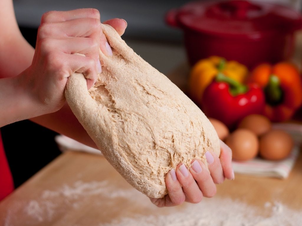 Stretching pizza dough 