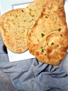 Finished naan bread on plate