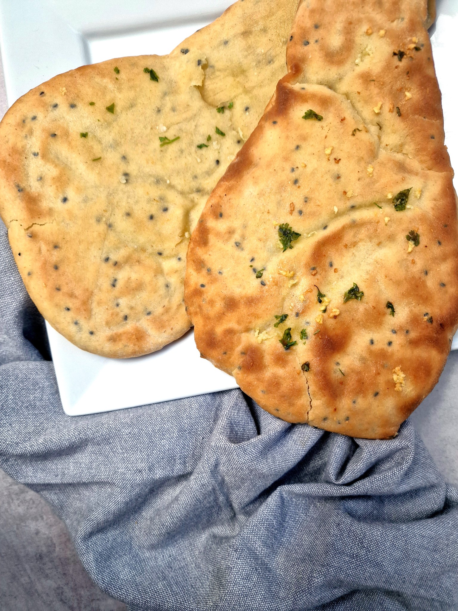 Finished naan bread on plate
