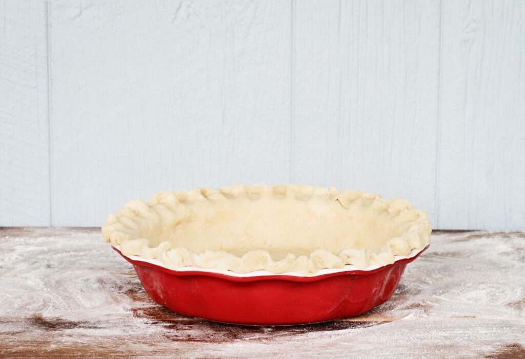 shortcrust pastry in a pie dish