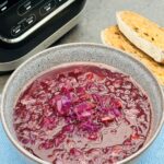 red cabbage soup next to Ninja soup maker