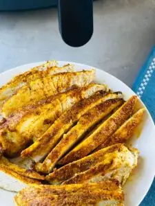 Sliced Moroccan style air fryer chicken breasts