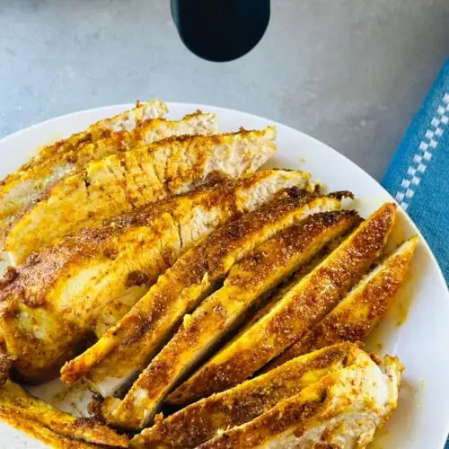 Sliced Moroccan style air fryer chicken breasts