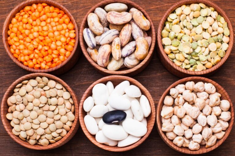different types of dried beans in bowls