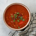 Quorn vegetarin mince soup in a bowl with fresh coriander sprinkled on top