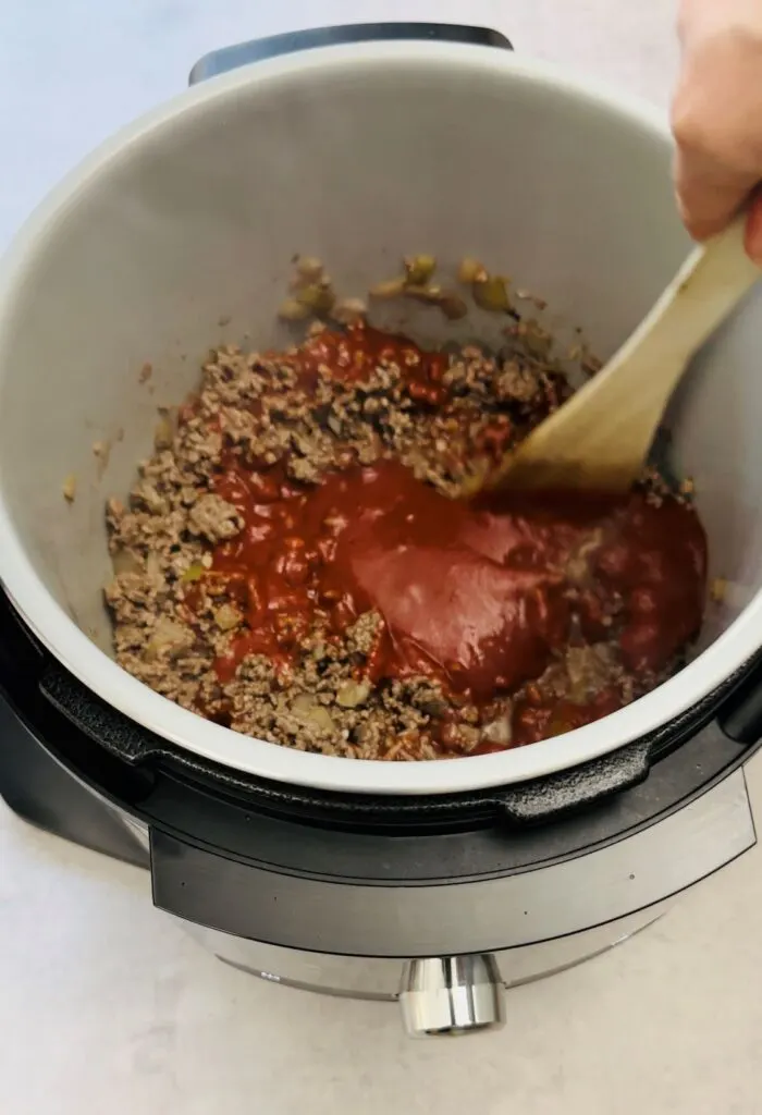 add tomatoes to bolognese in Ninja Foodi