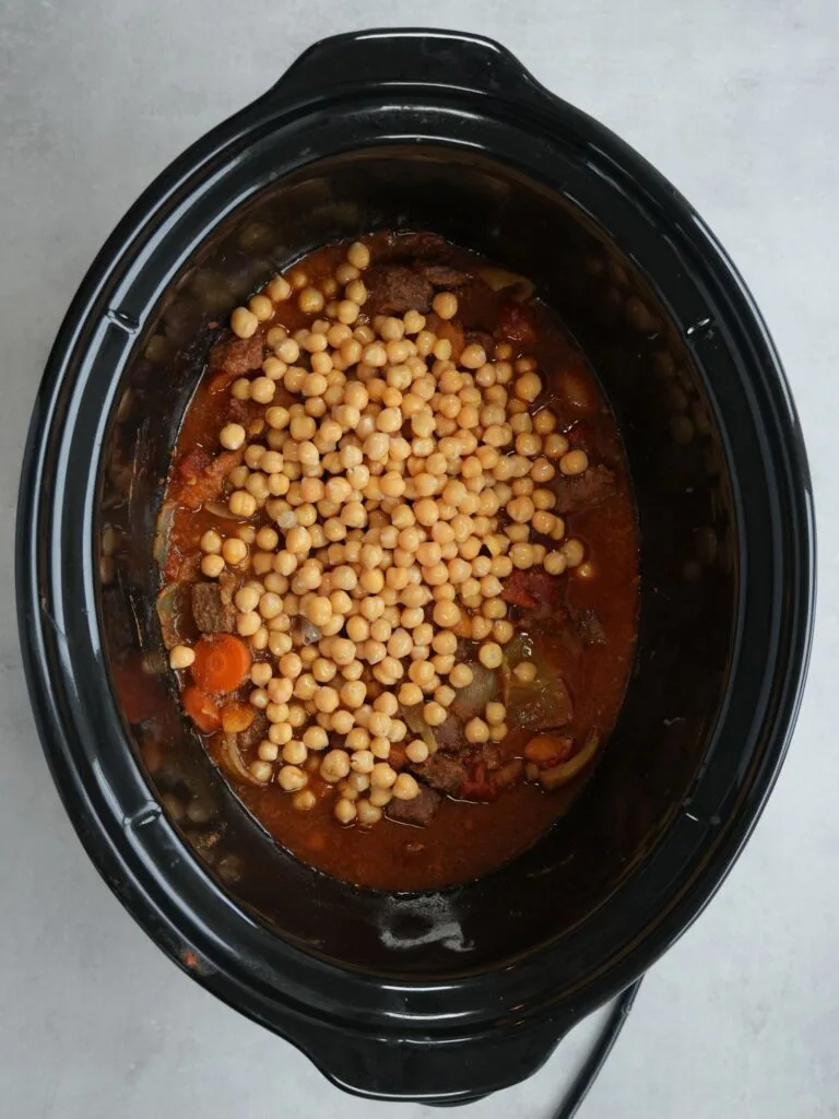 tinned chickpeas added to slow cooker
