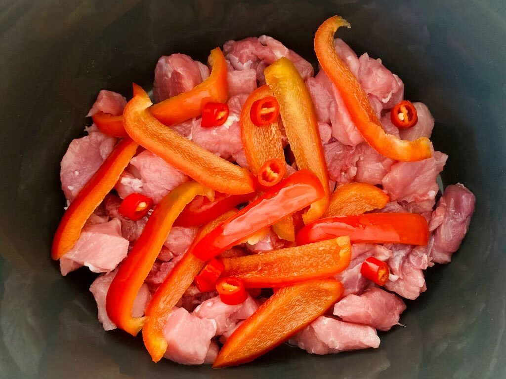 pork and pepper, chillies in slow cooker