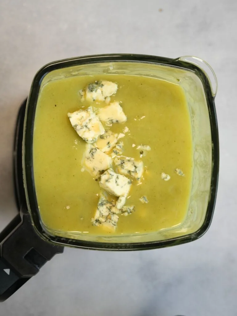 stilton broken up and added to broccoli soup in a soup maker jug