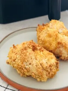 2 air fryer chicken kievs on plate