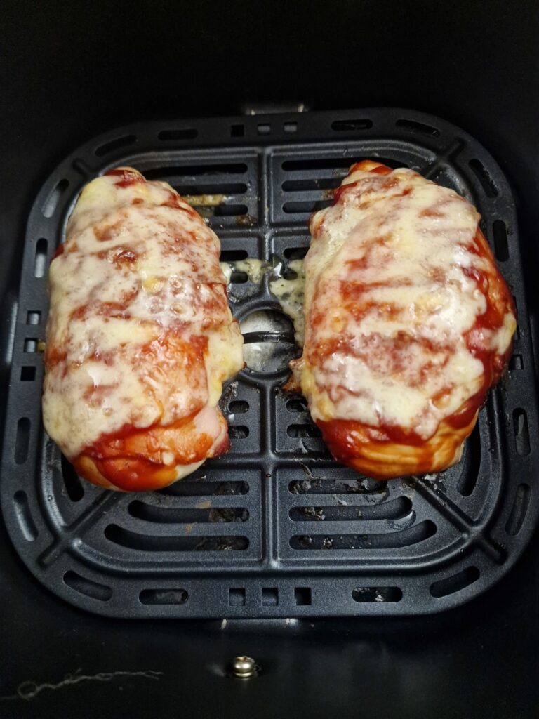cheese melted on hunters chicken in air fryer basket