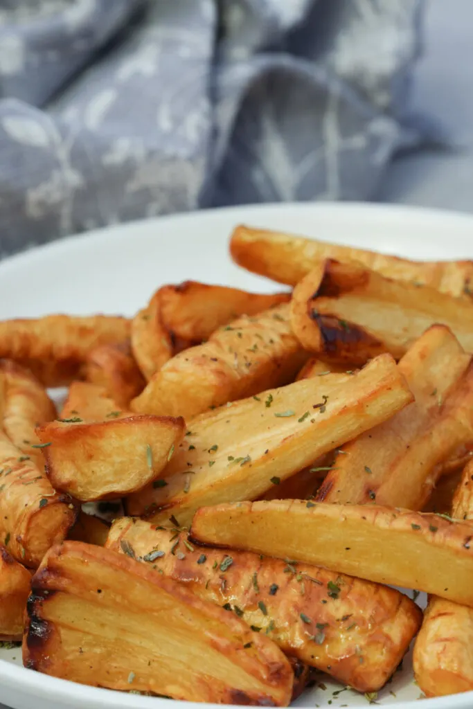 air fryer roasted parsnips on a plate