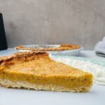 pumpkin pie slice next to air fryer