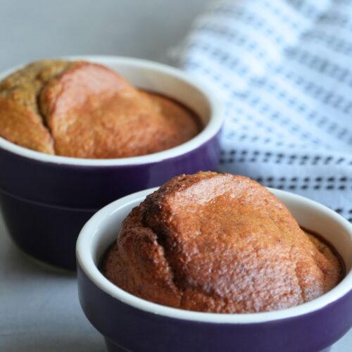 baked oats in purple ramekin bowls