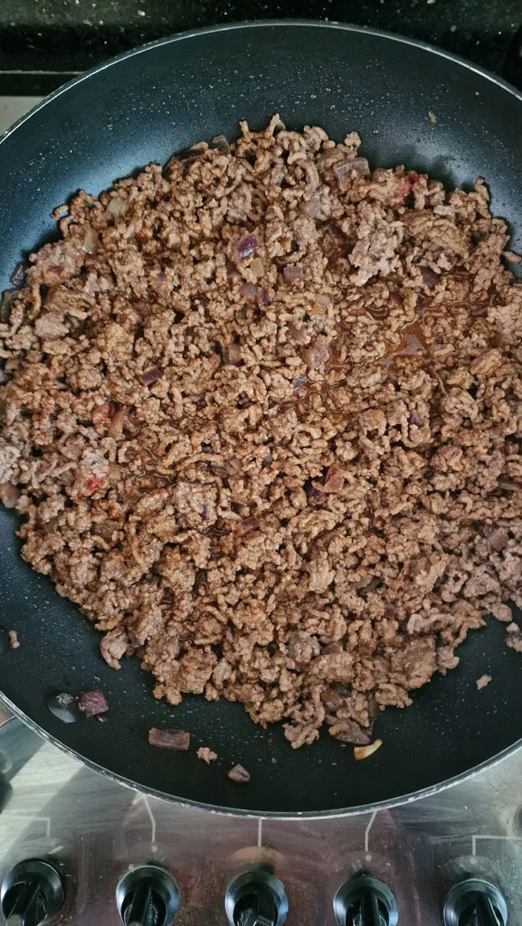 beef burrito mixture in pan