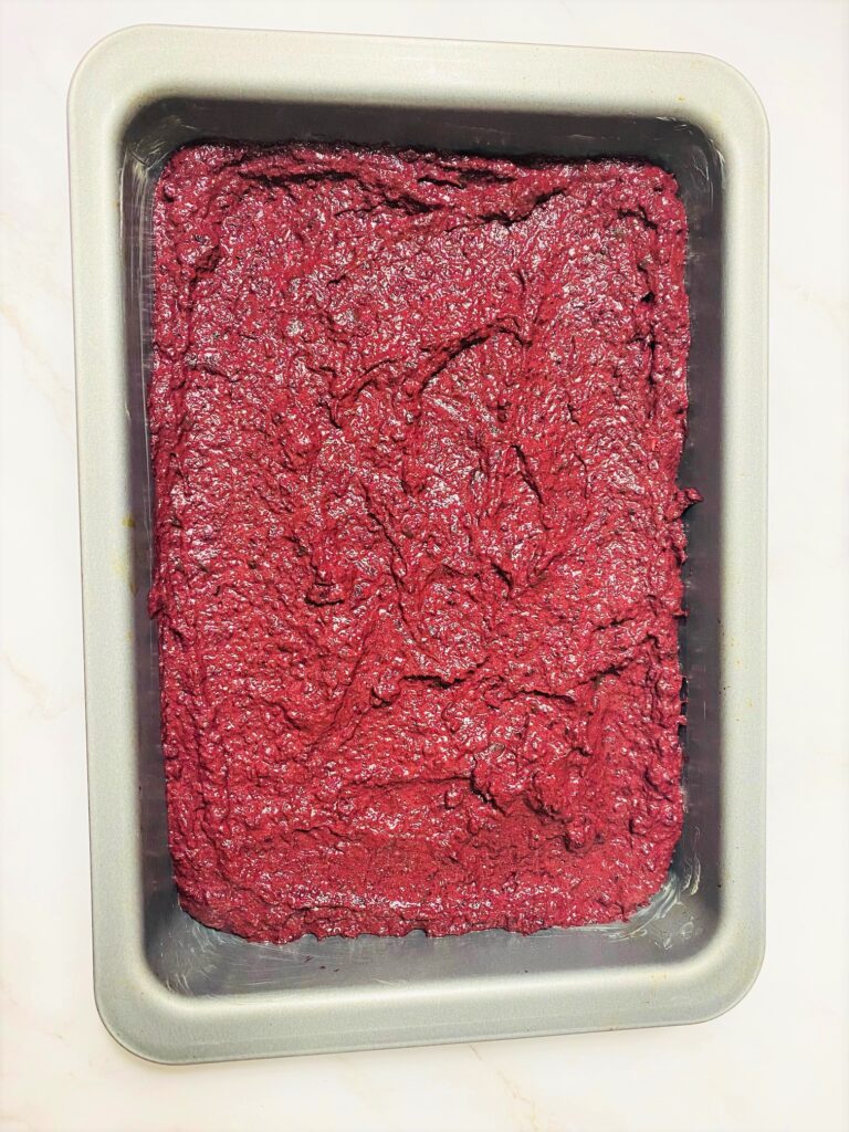 beetroot brownie batter in baking tine