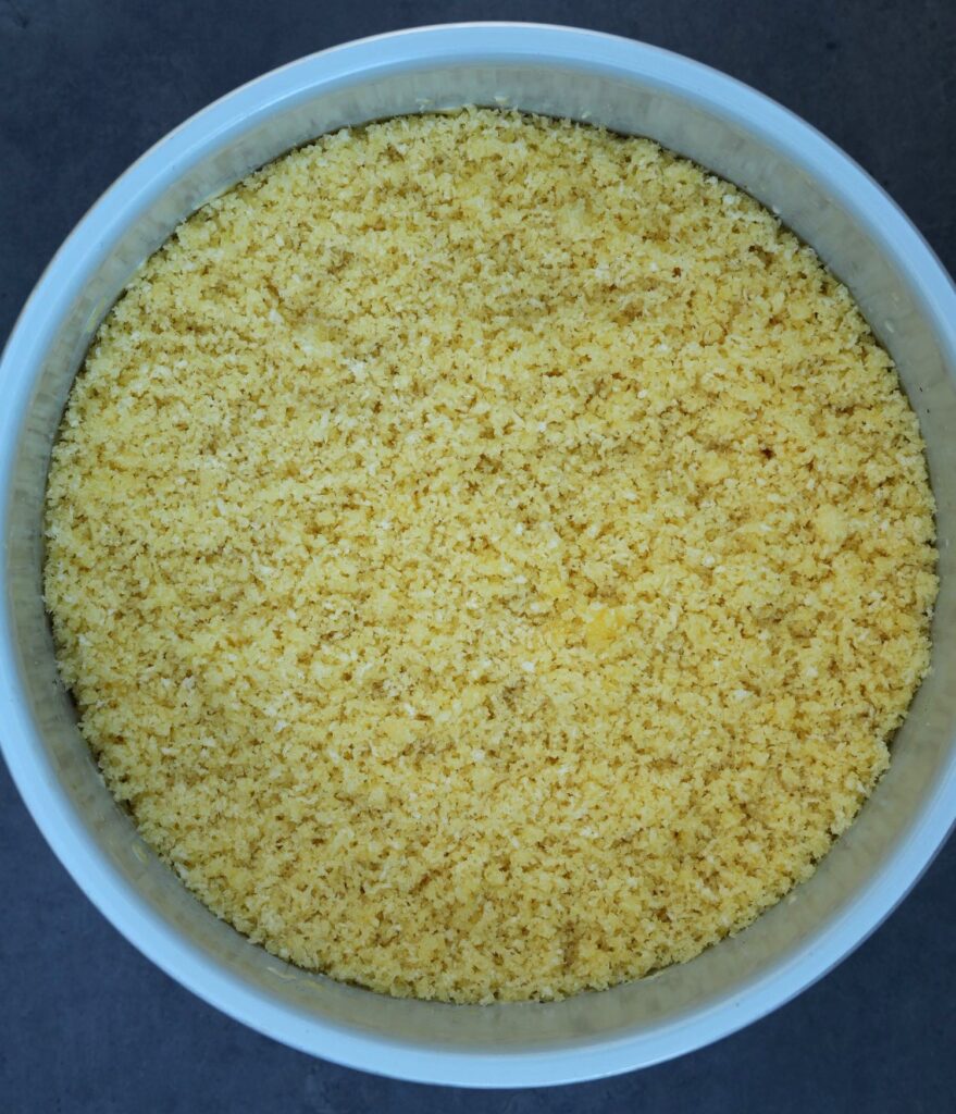 breadcrumbs on macaroni in pressure cooker bowl