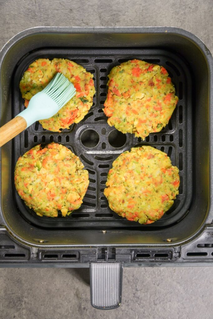 oiling bubble and squeak patties with silicone brush