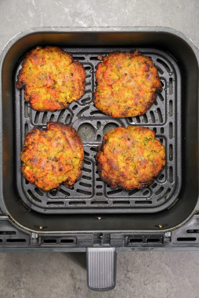 bubble and squeak cooked in air fryer, 4 patties in an air fryer basket
