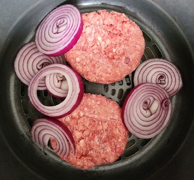 burgers with onions on top in the air fryer
