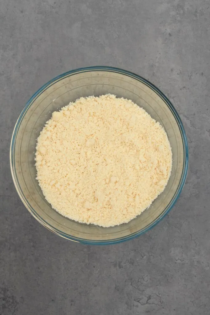 butter, flour, sugar in a mixing bowl for making rock cakes