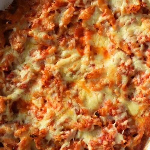 close up of cheesy chicken pasta bake
