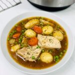 chicken casserole next to a Ninja Foodi 15-in-1